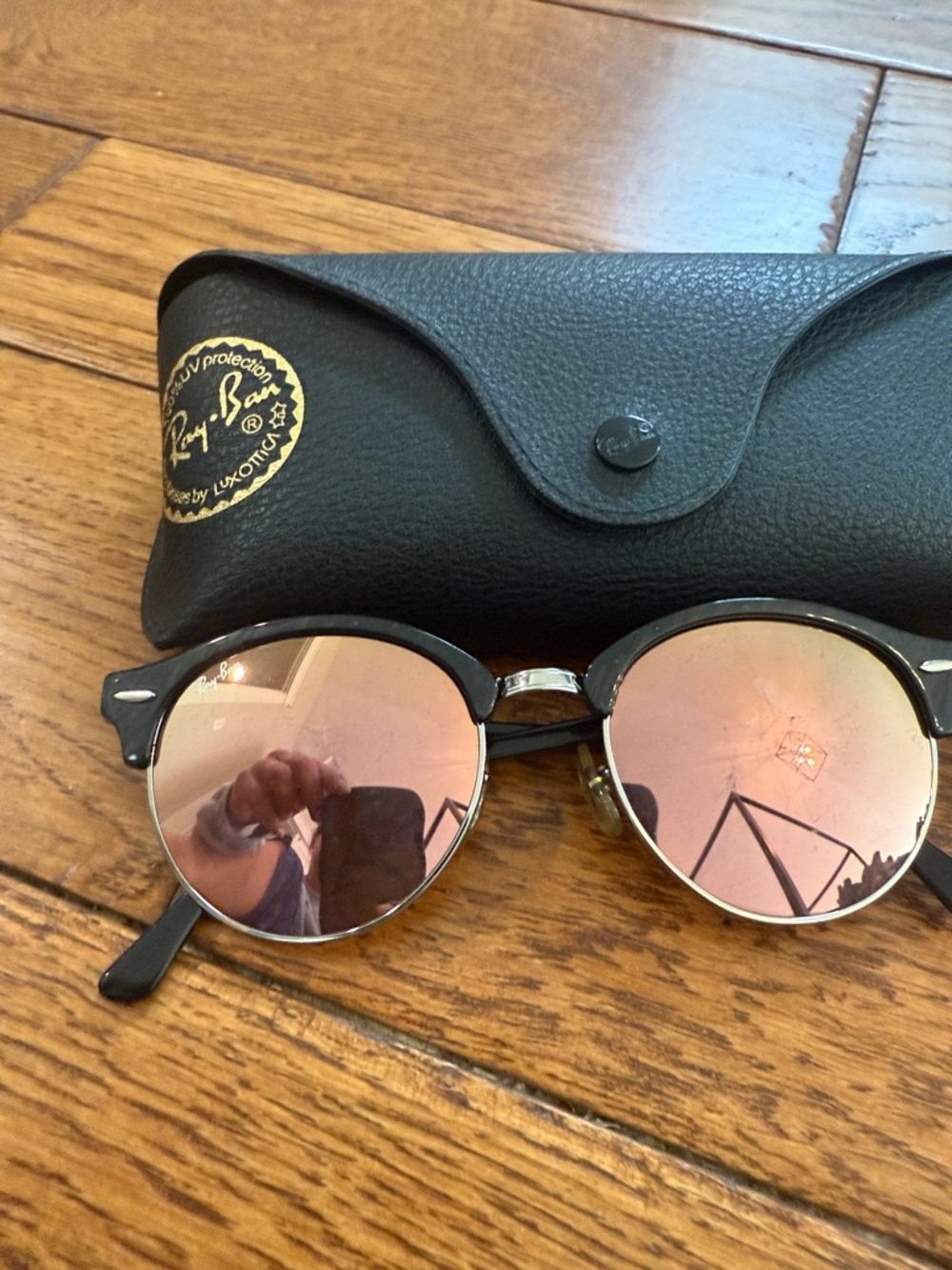 Ray-Ban Black Frame Sunglasses with Pink Mirror Lenses